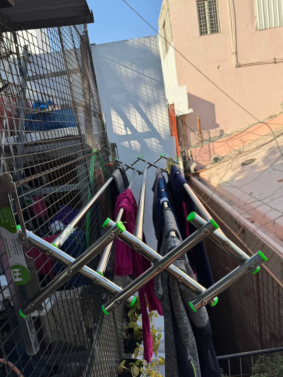 Flying Hangers: Stainless Steel Cloth Hangers for Grills & Windows